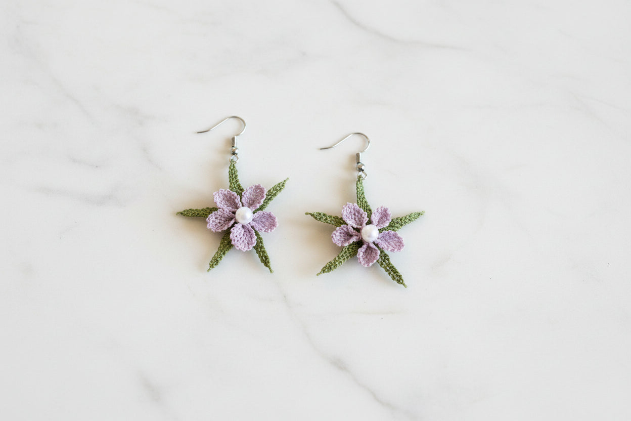 Handmade pastel floral crochet dangle earrings with lilac flower, green leaf accents and pearl center, lightweight boho earrings for women