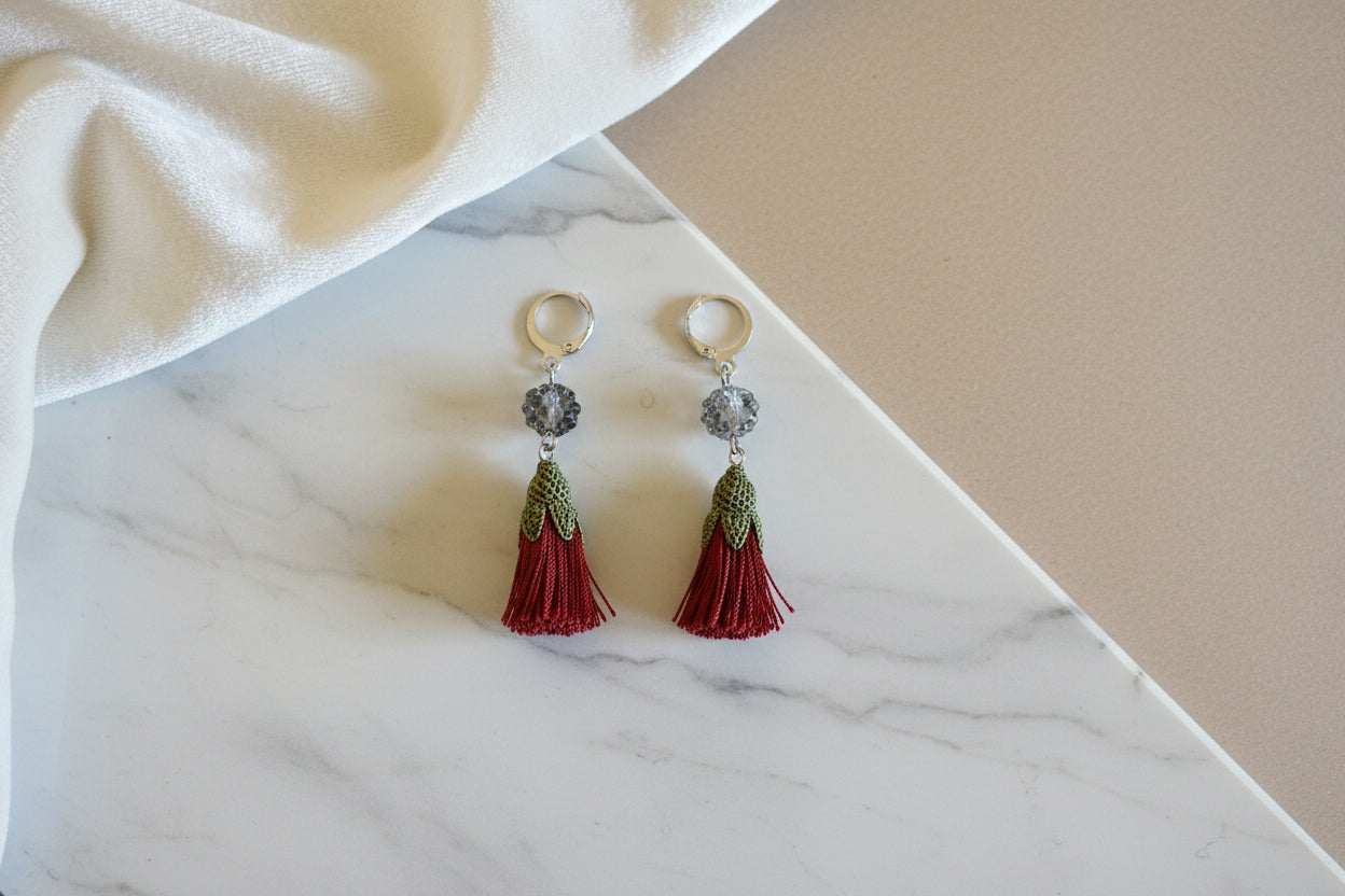 Handmade floral tassel dangle earrings with red tassels, green crochet flower cap and crystal bead accent, lightweight boho earrings for women