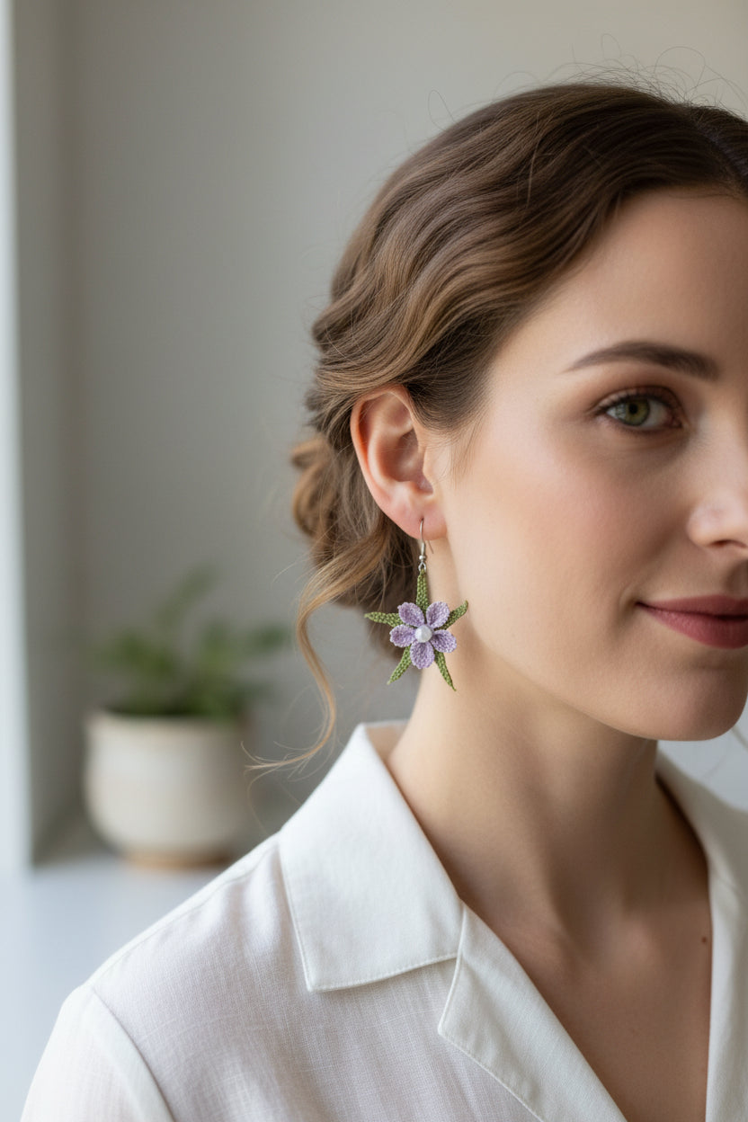 Handmade pastel floral crochet dangle earrings with lilac flower, green leaf accents and pearl center, lightweight boho earrings for women